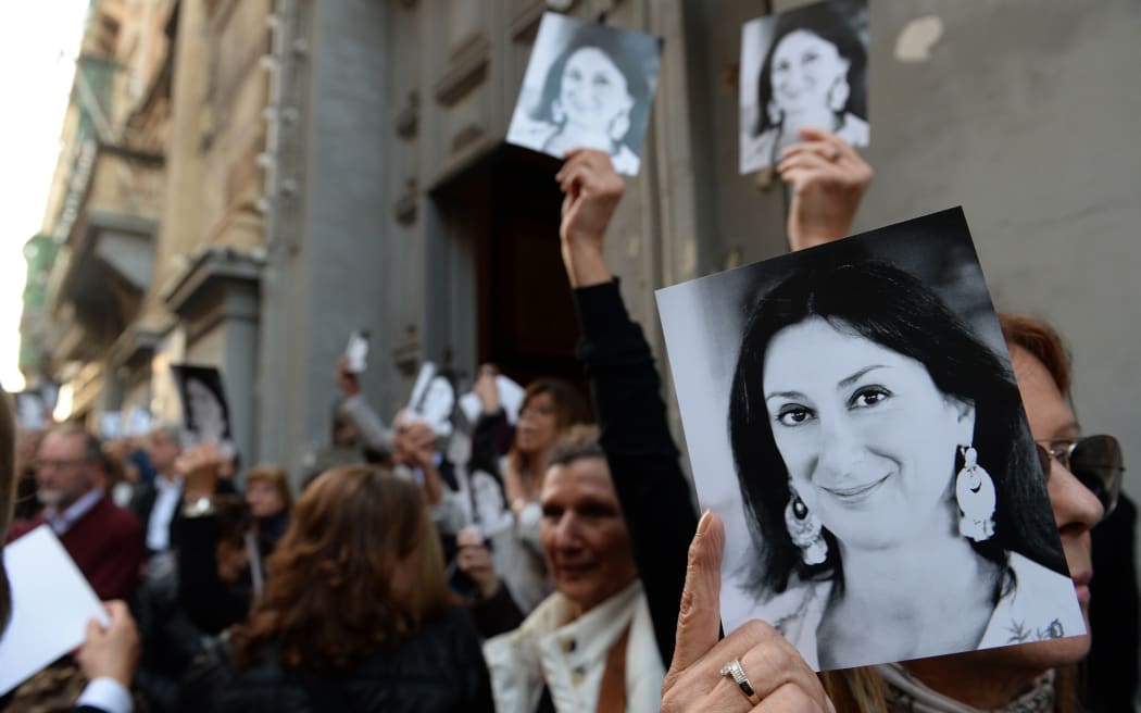 People leave the church of St Francis, after the Archbishop of Malta celebrated mass in memory of murdered journalist Daphne Caruana Galizia on the sixth month anniversary of her death in Valletta, Malta on April 16, 2018.