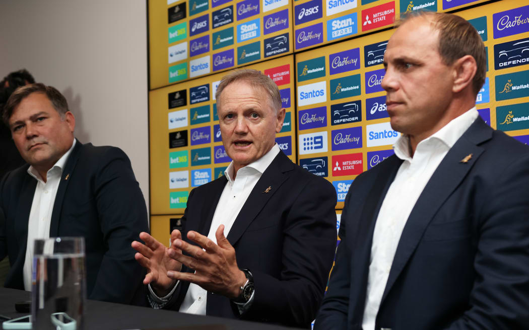 New Wallabies coach Joe Schmidt, flanked by Peter Horne and Phil Waugh.