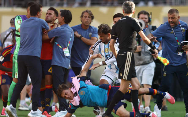 Argentina's midfielder #05 Leandro Paredes (top) clashes with Spain's midfielder #09 Gavi during the 2026 World Cup football tournament final match between Spain and Argentina at the New York/New Jersey Stadium in East Rutherford on July 19, 2026.  (Photo by CHARLY TRIBALLEAU / AFP)