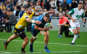 Blues loose forward Dalton Papali'i scores during the Super Rugby Aotearoa match against the Hurricanes at Eden Park.