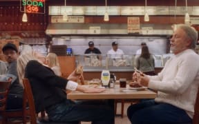 Meg Ryan and Billy Crystal, stars of the 1989 rom-com When Harry Met Sally, are pictured in a scene from their new Super Bowl ad for Hellmann's mayonnaise.