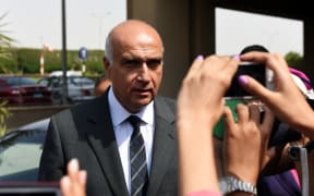 Newly-appointed Egyptian Tourism Minister Khaled Ramy arrives to Dar al-Fouad Hospital in a western Cairo suburb ahead of a visit to the injured tourists.