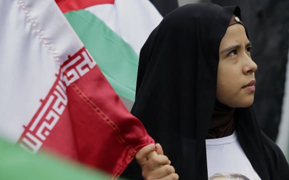 Members of the Mexican Association of Islamic Women and some Iranian women march to the Iranian Embassy in Mexico City.