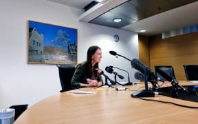 Prime Minister Jacinda Ardern speaking to reporters.