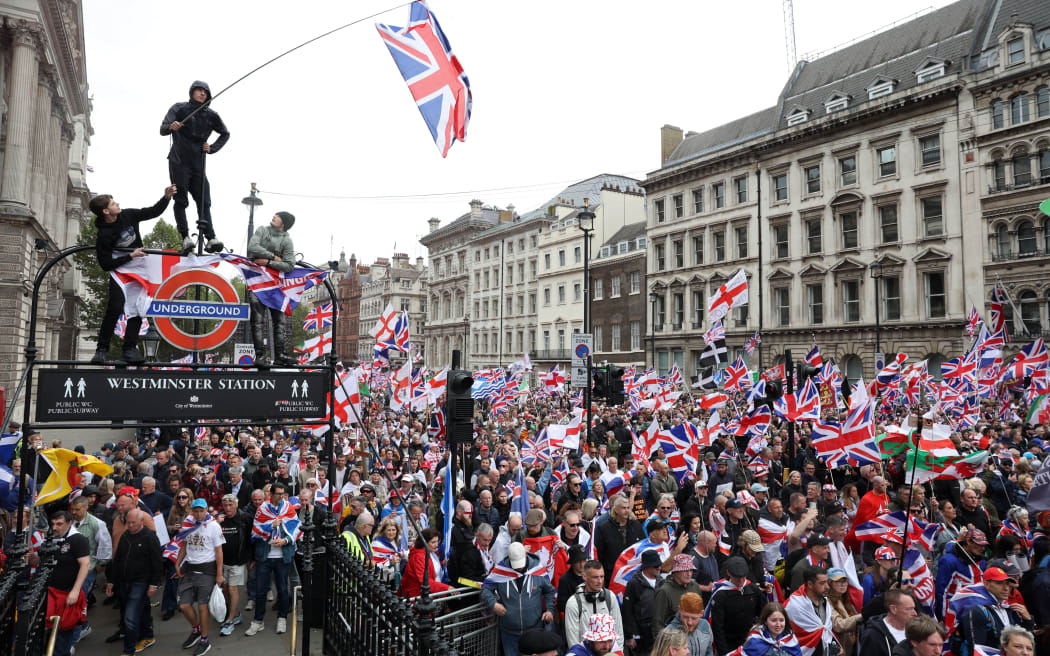 Tens of thousands turn out for UK far-right rally, counter demo | RNZ News
