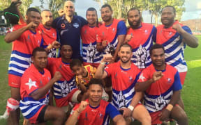 The West Papua Warriors celebrate beating the Philippines development team.