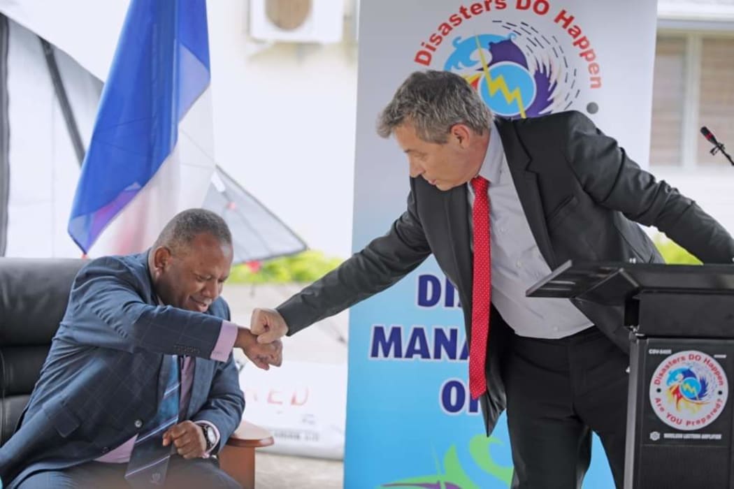 Fiji's Minister for National Disaster Management Inia Seruiratu and French Ambassador Jean-Francois Fitou.