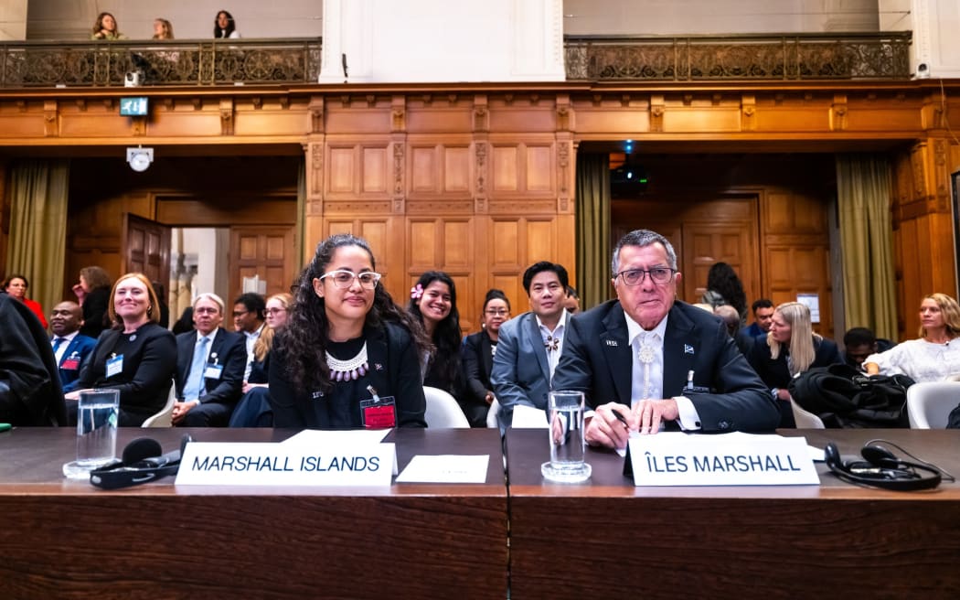Marshall Islands Ambassador to the United Nations John Silk, seated at right with Climate Envoy Kathy Jetnil-Kijiner, gave testimony in December at the International Court of Justice in support of a landmark climate change legal claim filed by Vanuatu.