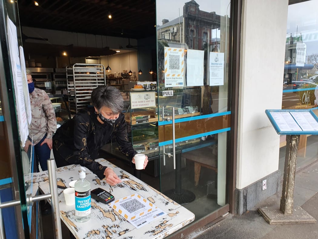 Oranna, one of the owners of Olafs Cafe in Mount Eden, isoverjoyed at being able to see customers again under level 3.