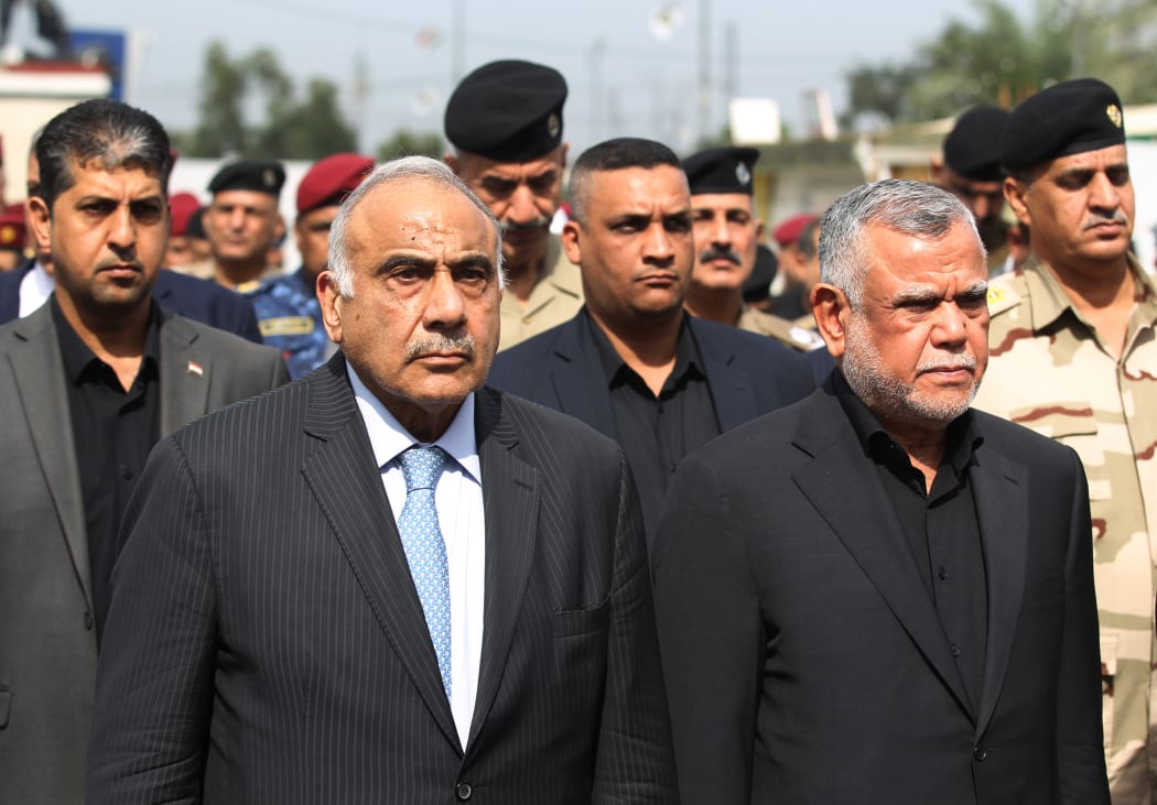 Iraq's Prime Minister Adel Abdel Mahdi (left) made his request for withdrawal in a phone call with US Secretary of State Mike Pompeo in line with a vote by Iraq's parliament last week.