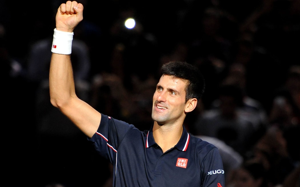 Novak Djokovic celebrates winning in Paris.