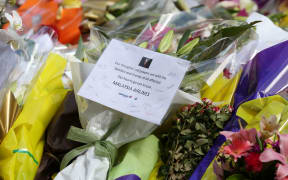 Flowers at the site of a siege in Sydney.