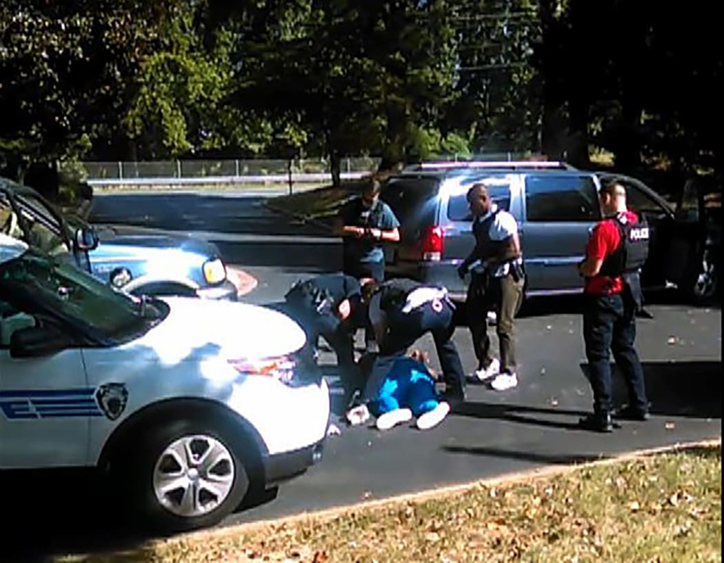 A frame grab from a video taken by Rakeyia Scott showing the moments after her husband Keith Scott was shot.