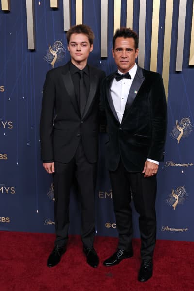 Irish actor Colin Farrell (R) and his son Henry Farrell arrive for the 77th Primetime Emmy Awards at the Peacock Theatre at LA Live in Los Angeles on September 14, 2025. (Photo by Patrick T. Fallon / AFP) / RESTRICTED TO EDITORIAL USE