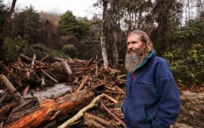 Ngātīmoti resident Shiloh Hobi on 13 July, 2025, after slash came through his property.
