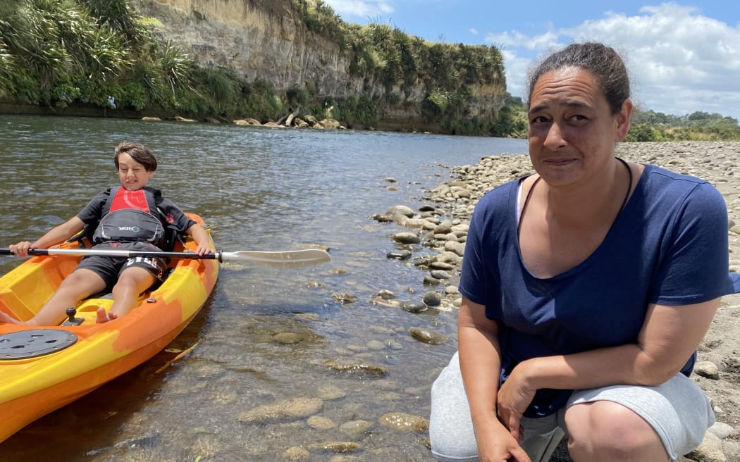 Arohaina Rangipunga was worried about her son Pango Foster, who swallowed water and even splashed himself in the face when paddling in for a photo.