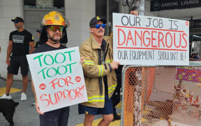 Auckland firefighters protest for better pay and work conditions.