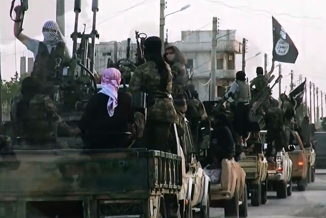 An image from an Islamic State video shows fighters entering Homs in 2014.