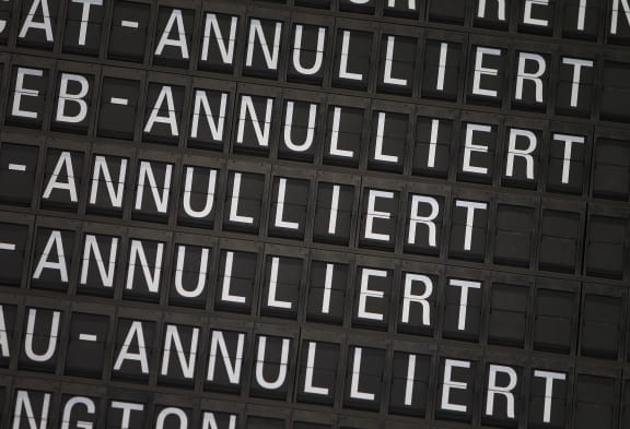 Cancelled flights displayed on a board at Frankfurt airport.