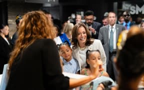 US Vice President Kamala Harris is out campaigning while President Biden is isolating with Covid. Along with her nieces, she ordered ice cream from Tyra Banks at the celebrity's new pop-up ice cream shop in Washington, DC, on 19 July, 2024.