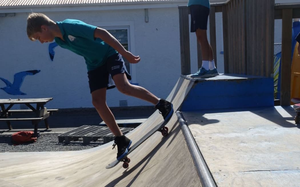 A skater in the current skate park.