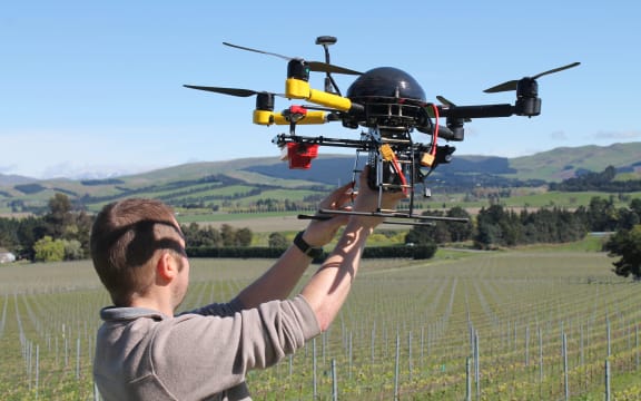 Rob Prileszky prepares to fly the quadcopter