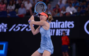 Maria Sharapova of Russia in action against Caroline Wozniacki of Denmark  January 18, 2019.