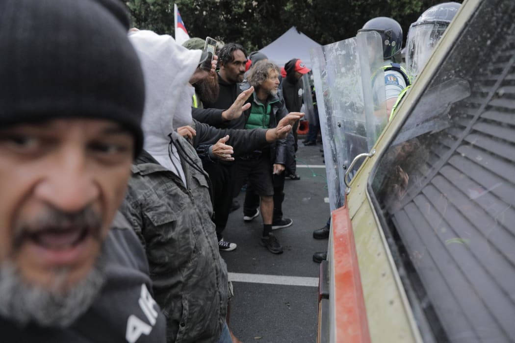 Protesters clash with police on day 23 of the occupation.