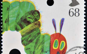 A stamp printed in Great Britain dedicated to animal tales shows The Very Hungry Caterpillar by Eric Carle