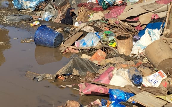 Rubbish pushed into piles in a settlement near Nadi during the cyclone clean-up