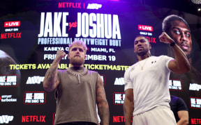 MIAMI, FLORIDA - NOVEMBER 21: Jake Paul and Anthony Joshua face off during the press conference about their exhibition match scheduled for December 19 at Kaseya Center on November 21, 2025 in Miami, Florida. (Photo by Leonardo Fernandez/Getty Images)