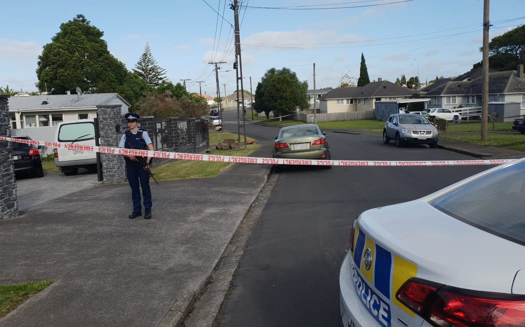 Armed police are protecting a cordoned off area in Mt Roskill where a person was stabbed and killed last night.