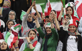 For the first time in decades Iranian women football fans attend football match - Iran's World Cup qualifier against Cambodia. at Azadi Stadium in Tehran, Iran, 10  October 2019.