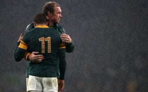 South Africa's Schalk Burger consoles team mate Bryan Habana at the final whistle.