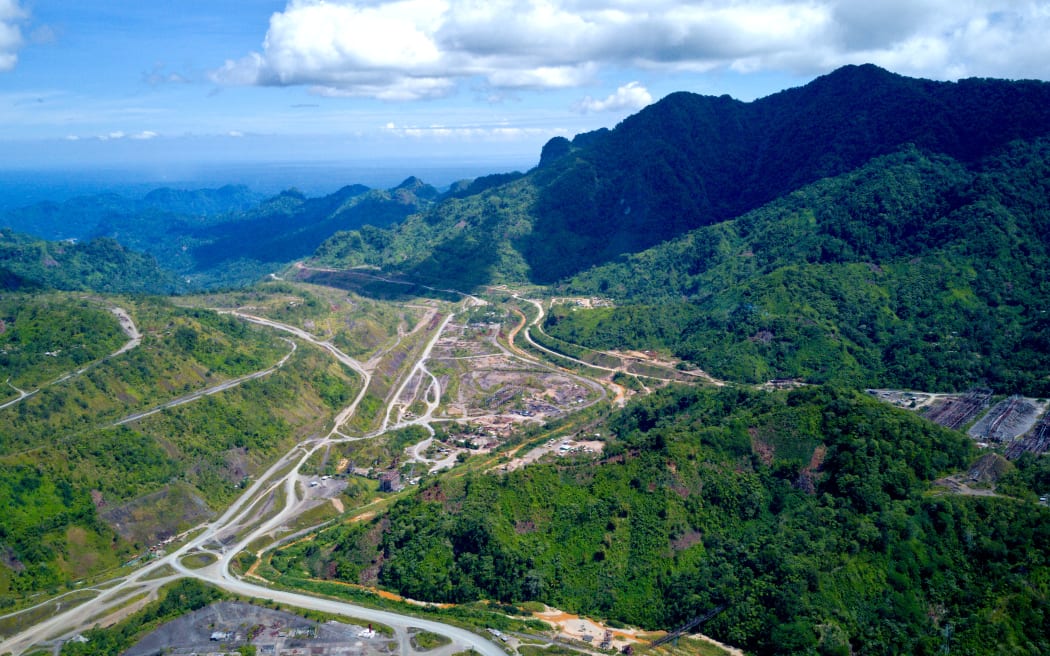 Panguna open pit copper mine in Bougainville. Shows the copper ore deposits and road networks around the mine.