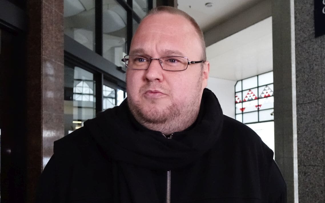 Kim Dotcom speaks briefly to media outside Auckland District court.