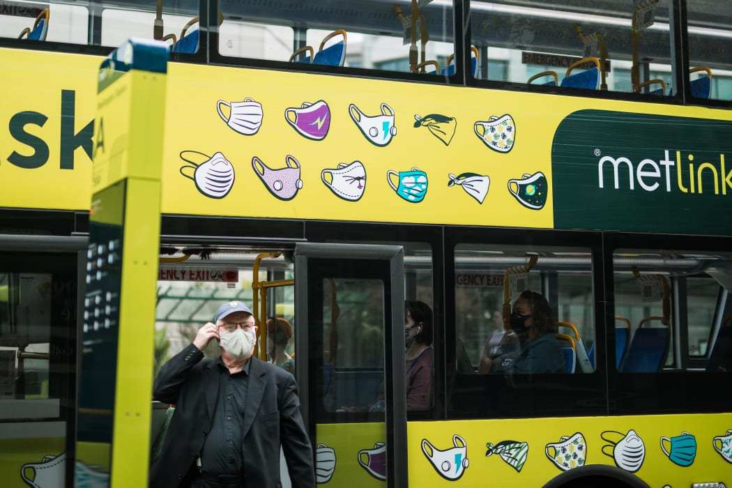 A bus passenger wears a mask during level 2 in Wellington, 15 February 20201.