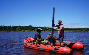 Sediment core in Lake Spectacle.