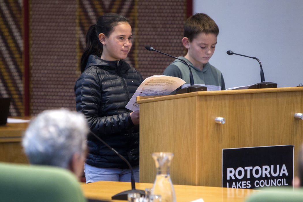 Lake Rerewhakaaitu School students Antoinette Arnott, 13, (left) and Griffin Hine, 12, speak at a council committee meeting in June 2019.