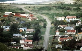 Aramoana in 1990, taken while police hunt for killer David Gray.