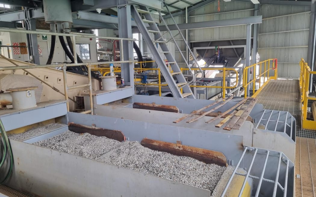 A vibrating platform that has 36 millimetre holes to help sift through the gravel at Millers Flat gold mine.