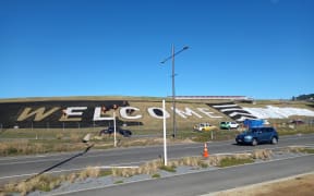 Workers were forming Wellington Airport's 'welcome' sign on Sunday