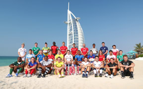All 28 captains pose ahead of the 2019 Dubai 7s, including Fiji's Paula Dranisinukula (front 3L), Samoa's Tomasi Alosio (middle 5R) and Fijiana skipper Luisa Tisolo (back 3R).