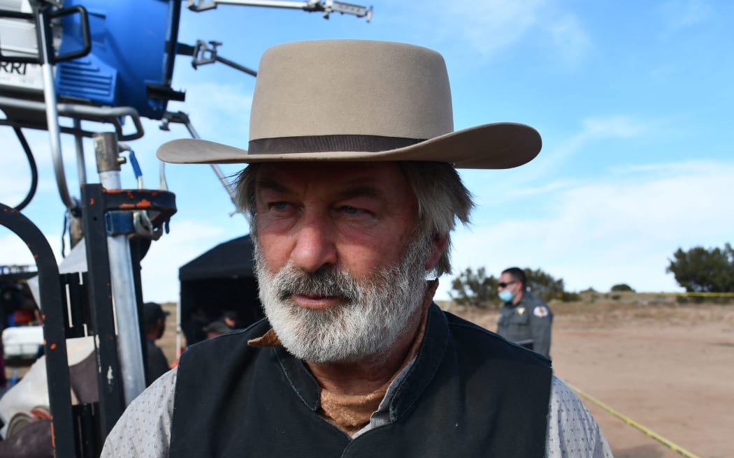 (FILES) This handout image courtesy of Santa Fe County Sheriff's Office released April 25, 2022 and part of the investigative files, shows actor Alec Baldwin being processed after the death of cinematographer Halyna Hutchins at the Bonanza Creek Ranch in Santa Fe, New Mexico, October 21, 2022. - Filming will resume this week on Alec Baldwin's "Rust," producers said Tuesday, some 18 months after it was halted by the fatal on-set shooting of the movie's cinematographer.
Hollywood star Baldwin was holding a Colt .45 gun during rehearsals for the film in the southwestern state of New Mexico when it discharged, killing Halyna Hutchins and wounding director Joel Souza. (Photo by Santa Fe County Sheriff's Office / AFP) / RESTRICTED TO EDITORIAL USE - MANDATORY CREDIT "AFP PHOTO / Santa Fe County Sheriff's Office / HANDOUT " - NO MARKETING - NO ADVERTISING CAMPAIGNS - DISTRIBUTED AS A SERVICE...