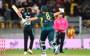 Australian captain Mitchell Marsh celebrates winning the First Chappell-Hadlee Trophy T20 International against New Zealand, 2024.
