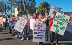 Striking secondary school teachers picketing outside Selwyn College in Auckland on Wednesday, 29 March.