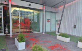 Red paint dripping down the doors of the United States consulate and Ministry of Foreign Affairs building in Auckland on 14 November, 2023.