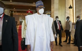 President of Nigeria Muhammadu Buhari arrives in Bamako on July 23, 2020, where West African leaders will gather in a fresh push to end an escalating political crisis in the fragile state of Mali.