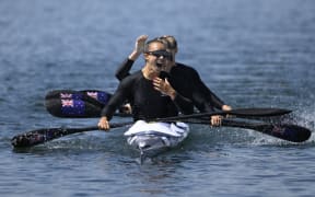 New Zealand's gold medallists Lisa Carrington, Alicia Hoskin, Olivia Brett and Tara Vaughan celebrate their victory in the women's kayak four 500m final of the canoe sprint competition at Vaires-sur-Marne Nautical Stadium in Vaires-sur-Marne during the Paris 2024 Olympic Games on August 8, 2024. (Photo by Olivier MORIN / AFP)