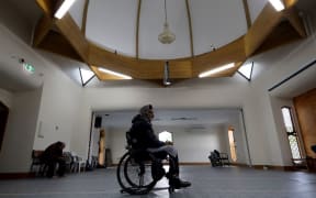 Farid Ahmed (C), a survivor of the twin mosque massacre, offers prayers inside the Al Noor mosque,